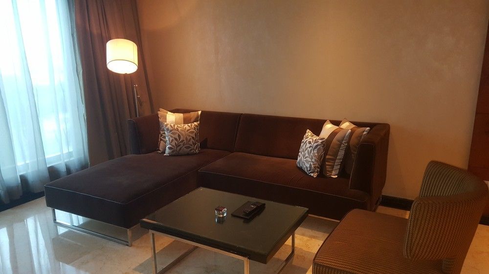 Vivanta Hyderabad, Begumpet Luaran gambar A living room in a suite at the Ritz-Carlton, Kuala Lumpur